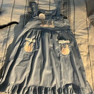 Brand new lolita dress with a bunny design, it has a bunnies on the pockets🩵🩷